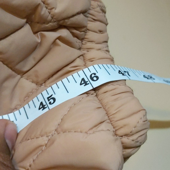 Sela| Tan Unisex Onesie Snowsuit buttoned and zippered with zippered pockets - Picture 12 of 13
